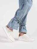 Białe dziurkowane skórzane sneakersy - 41