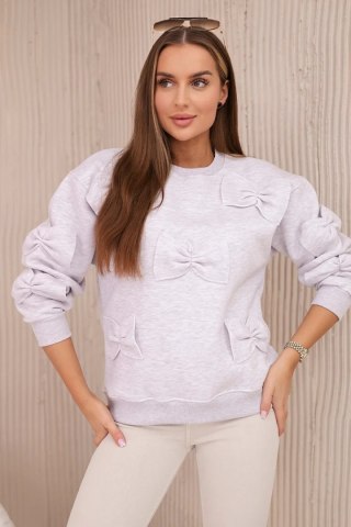 Bluza ocieplana ze ściągaczem i ozdobnymi kokardami beżowy melanż uniwersalny