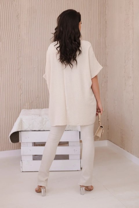 Bluzka oversize z wisiorkiem beżowa Bluzka oversize z wisiorkiem beżowa